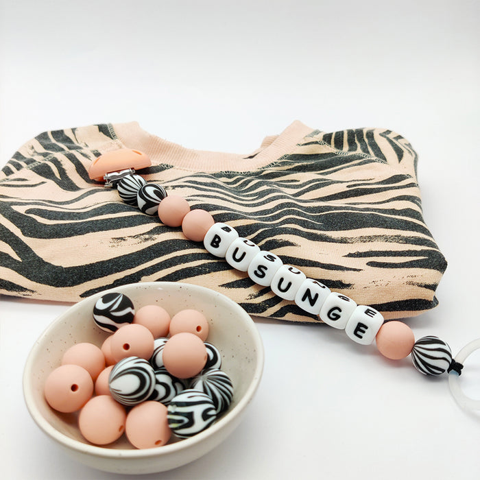 Silikonpärlor, zebra, 15mm