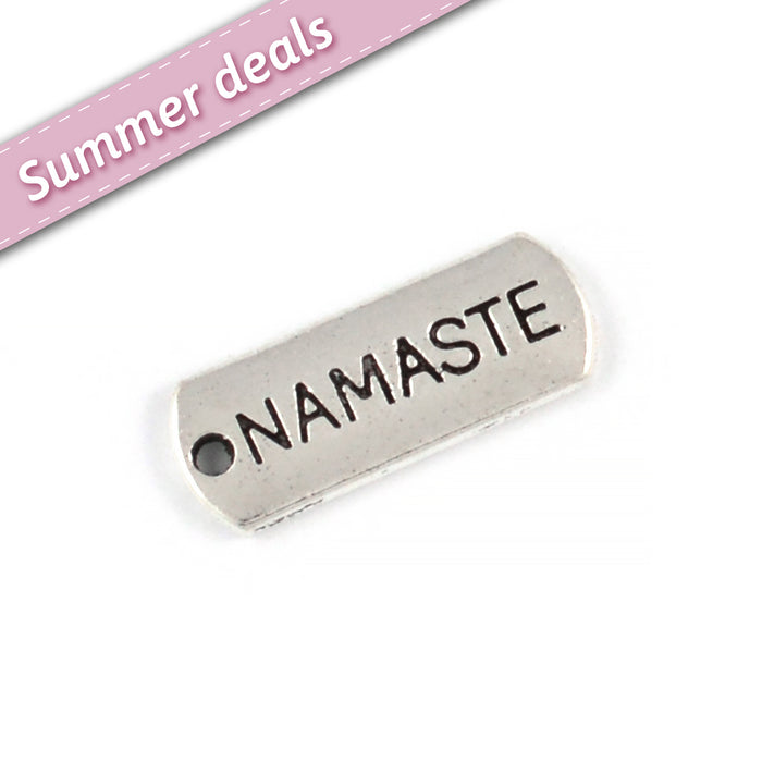 Berlock/tag "namaste", antiksilver, 21mm, 5st