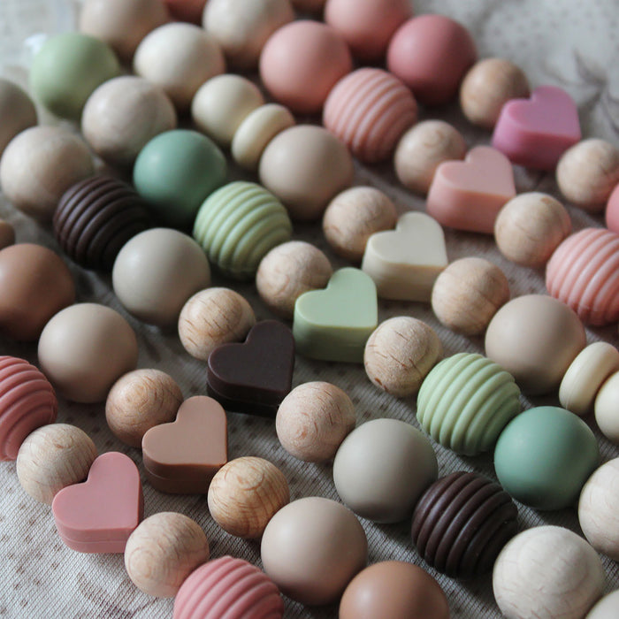 Räfflad silikonpärla, dusty pink, 15mm