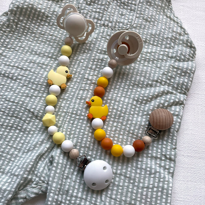 Kantig silikonpärla, pastellgul, 16mm