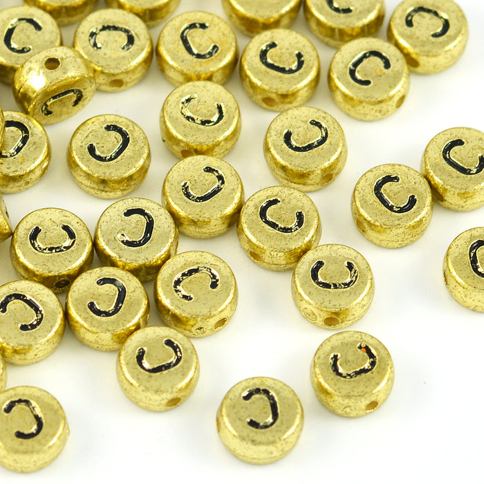 Bokstavspärlor, guld, A–Z