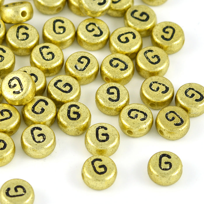 Bokstavspärlor, guld, A–Z