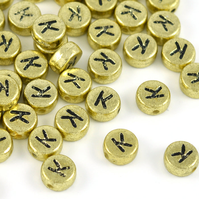 Bokstavspärlor, guld, A–Z