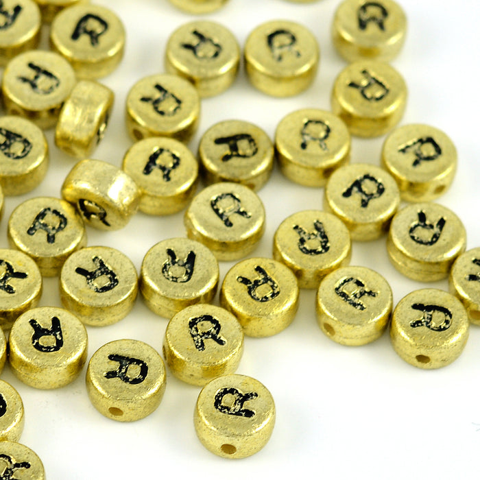Bokstavspärlor, guld, A–Z