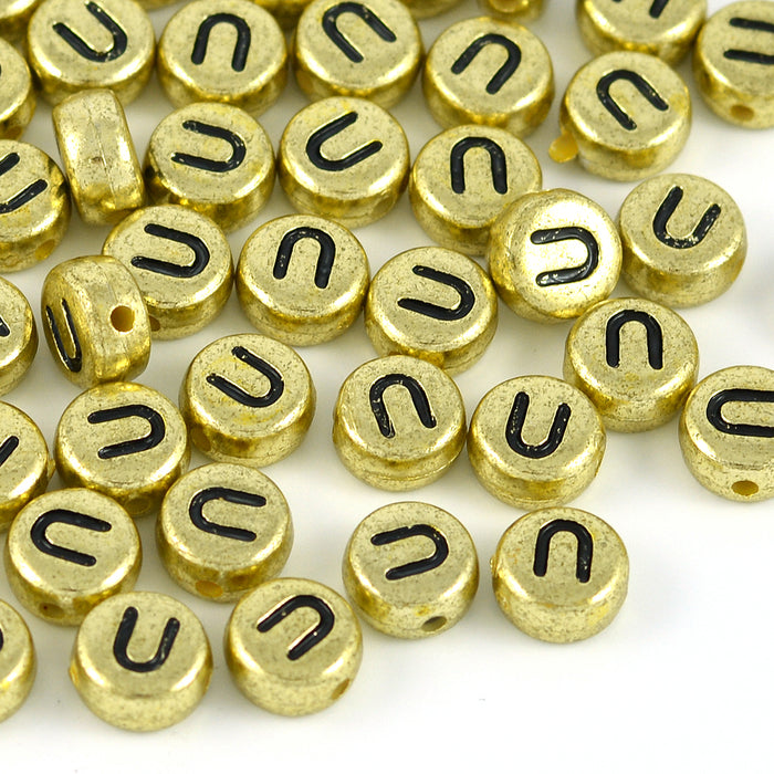 Bokstavspärlor, guld, A–Z