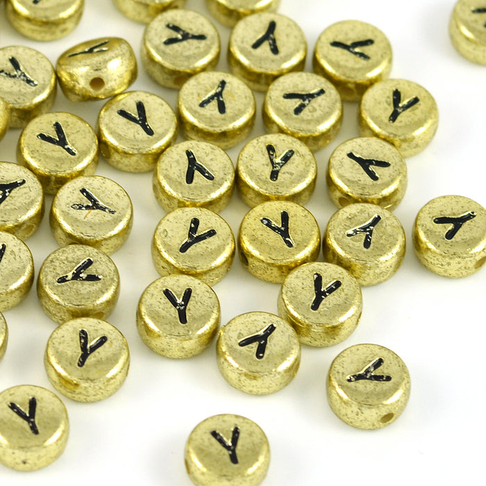 Bokstavspärlor, guld, A–Z