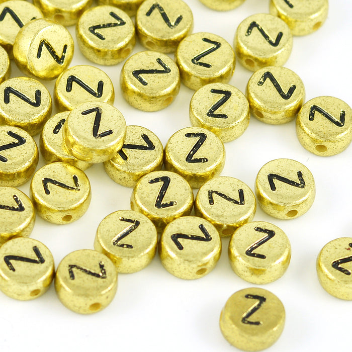 Bokstavspärlor, guld, A–Z