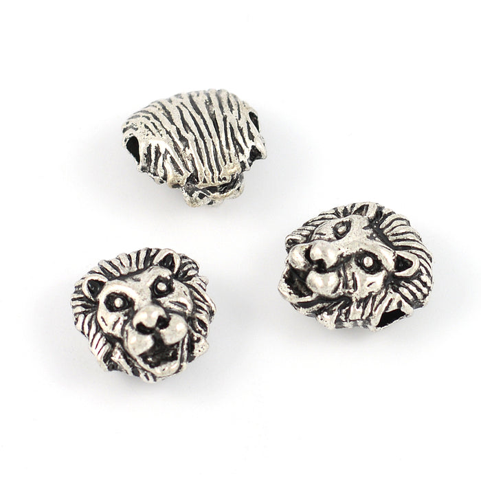 Metallpärlor, lejonhuvud, antiksilver, 12x13mm, 3st