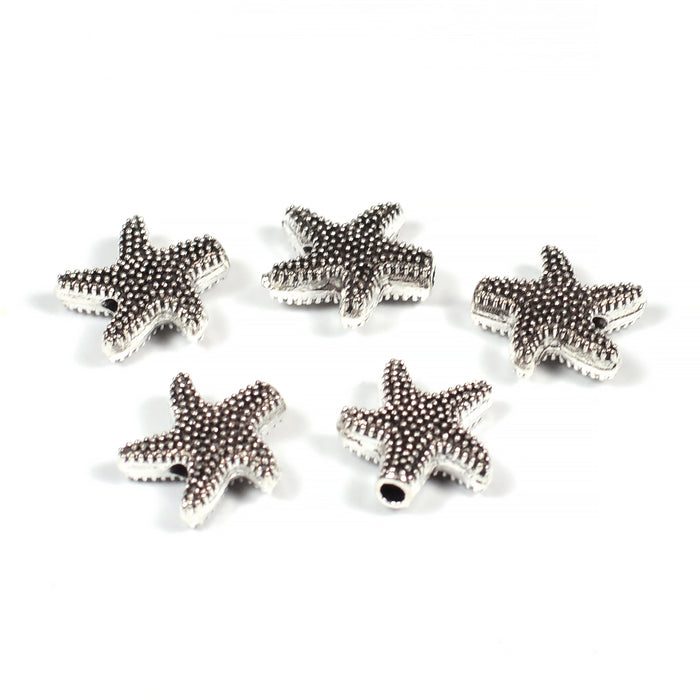 Metallpärlor, sjöstjärnor, antiksilver, 10mm, 10st
