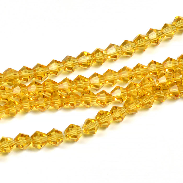 Bicone glaspärlor, guld, 4mm