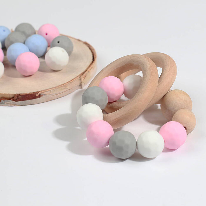 Faceted silicone bead, pastel pink, 15mm