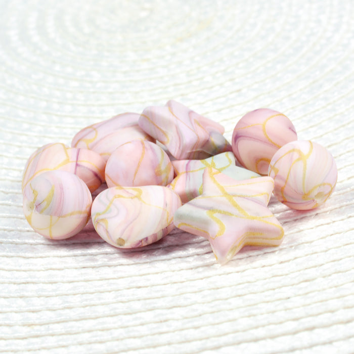 Motif bead in silicone, star, pastel gold