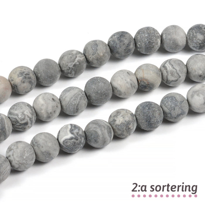 Frostade maifanit pärlor, grå, 5–6mm – 2:a sortering
