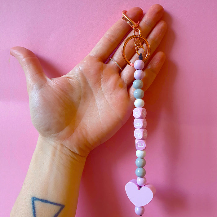 Light pink wooden letter beads, 10mm, cubes, A–Z