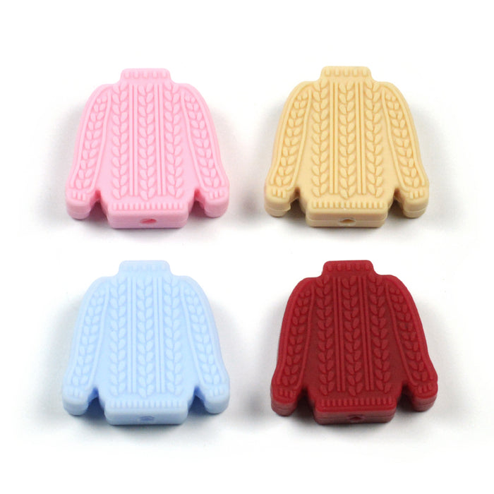 Motivpärla i silikon, stickad tröja