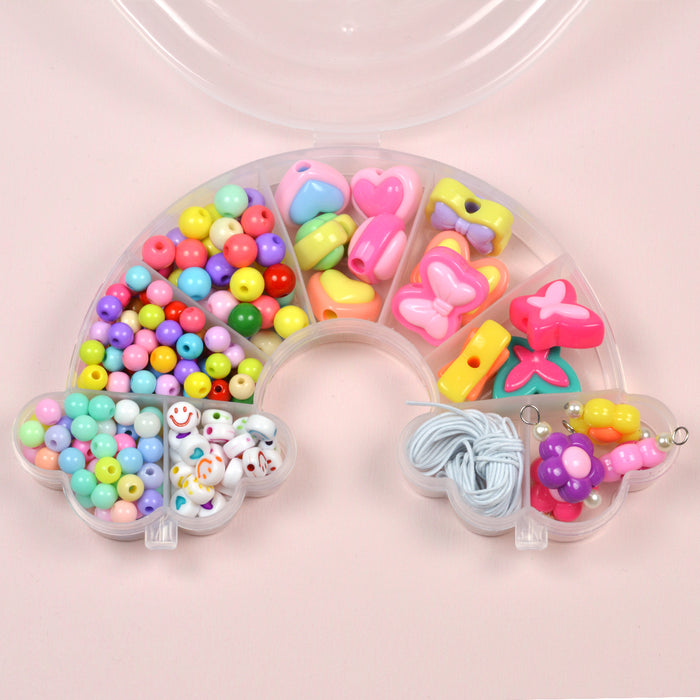 Glada pärlor i regnbågslåda