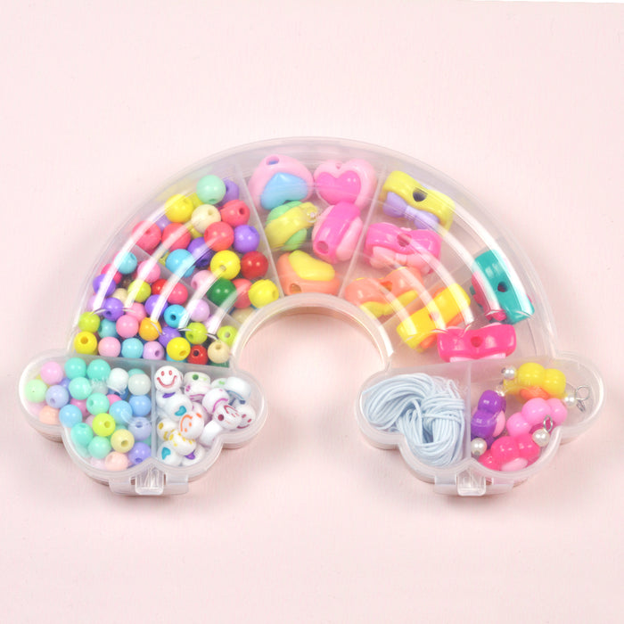 Glada pärlor i regnbågslåda