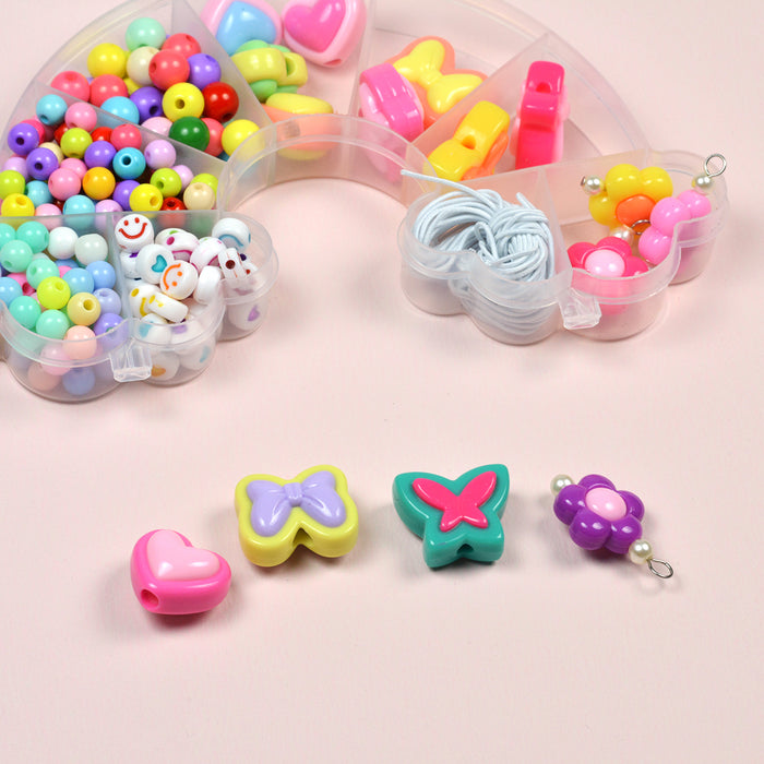 Glada pärlor i regnbågslåda