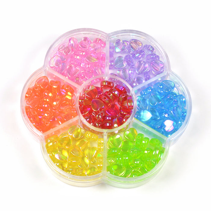 Pyssellåda med hjärtan i regnbågsfärger