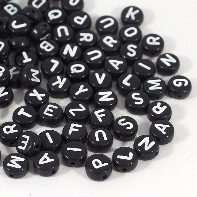 Black letter beads, mixed