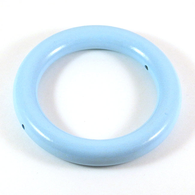 Large wooden ring with holes, light blue