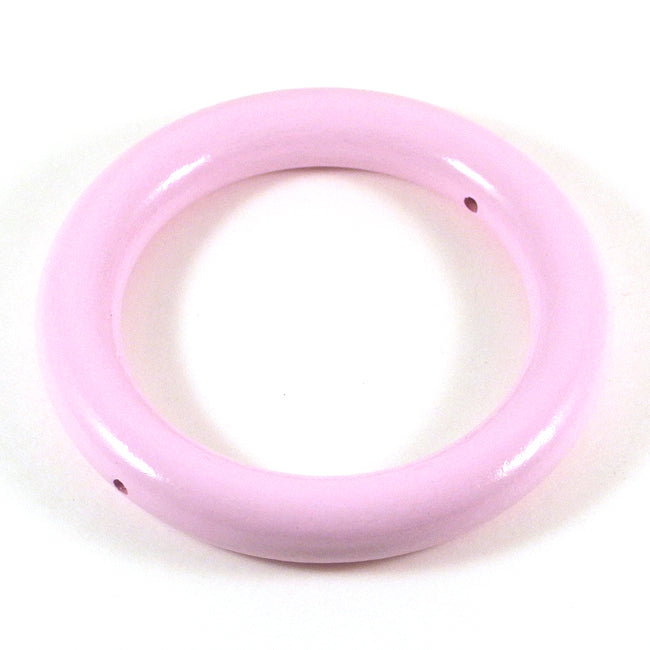 Large wooden ring with holes, light pink