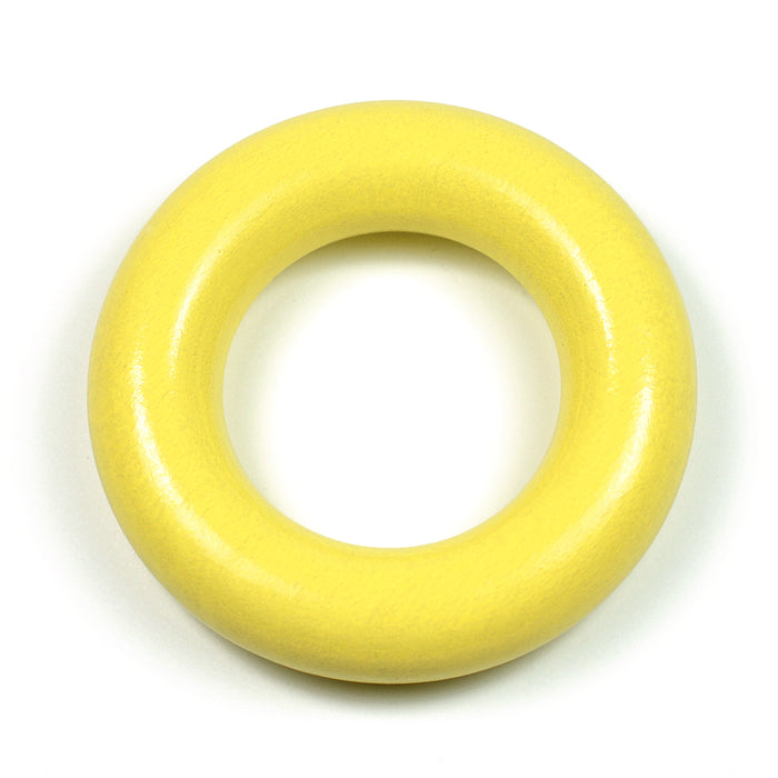 Small wooden ring without holes, pastel yellow