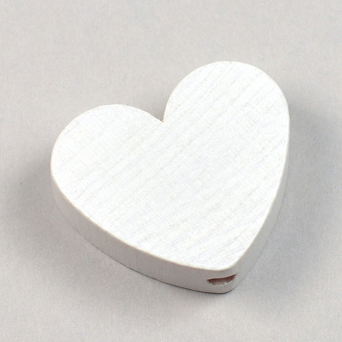 Motif bead in wood, heart