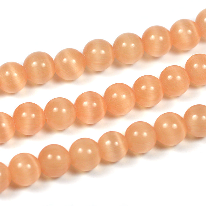 Cat eye glass beads, apricot, 6mm