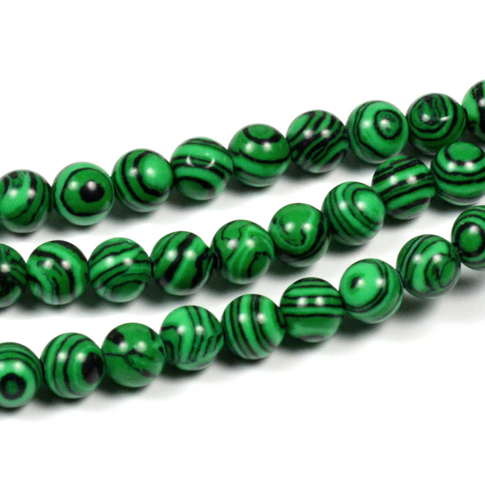 Syntetiska malakit pärlor, svart-grön, 6mm